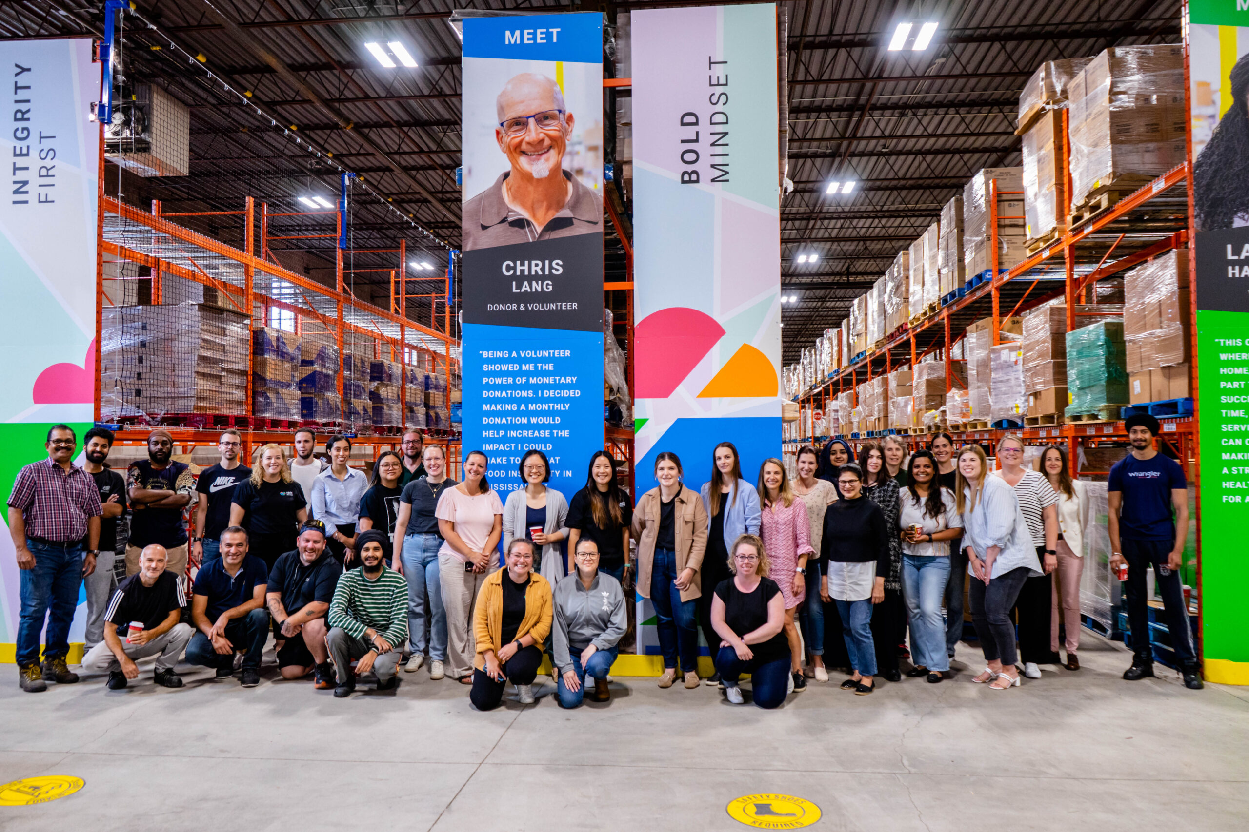 Food Banks Mississauga staff team in their warehouse.