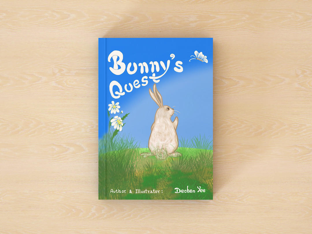 Illustrated cover of a book called Bunny's Quest by Dechen Yee featuring a grey and white bunny on green grass next to two daisies and against a blue sky.